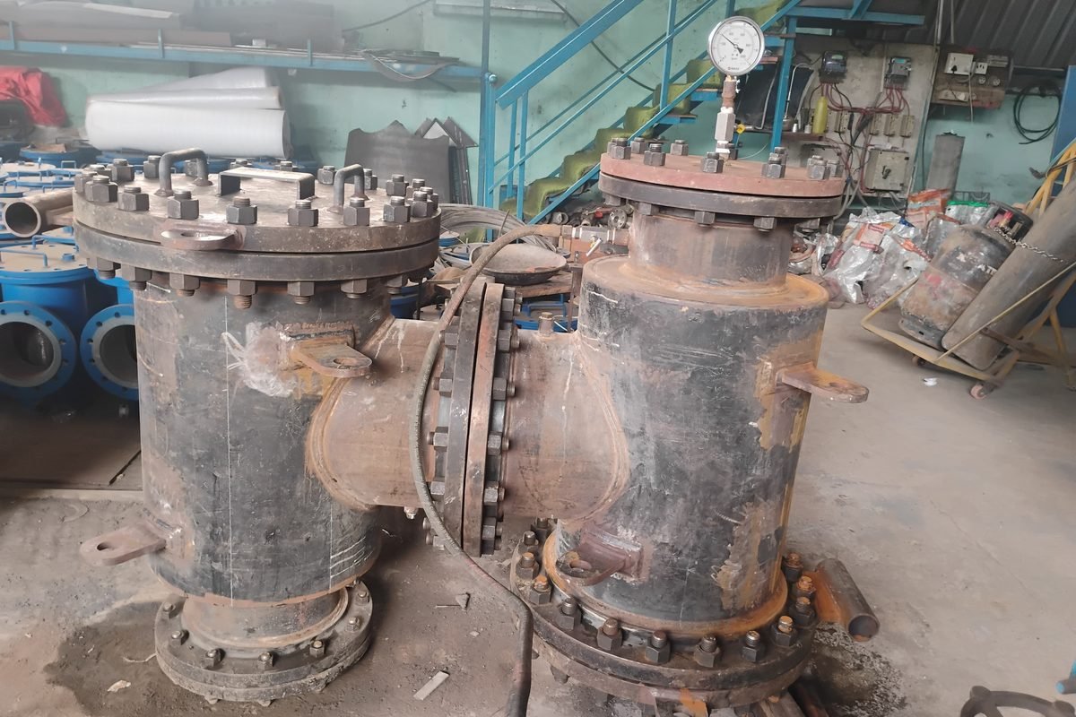 Assembled strainers fitted with pressure gauges during hydrostatic testing