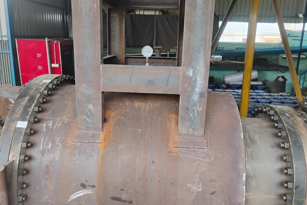 Heavy machining operation in progress on a fabricated strainer body at the LKS Industries works