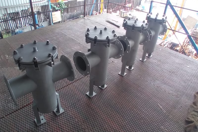 Set of four fabricated basket strainers finished and coated before despatch