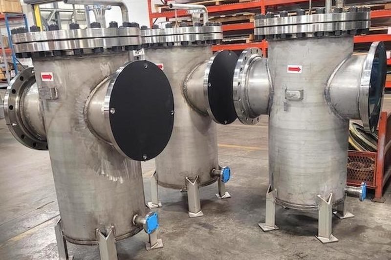 Row of stainless steel vessels manufactured for food and beverage processing
