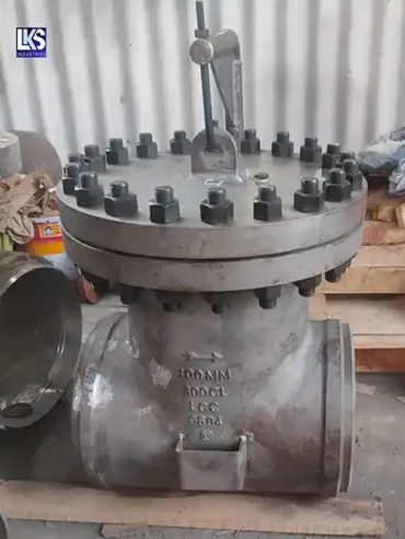 Large cast steel gate valve with bolted bonnet resting on a pallet